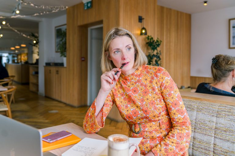 Genevieve White from Campion Copy looking thoughtful about email newsletter content for tourism businesses