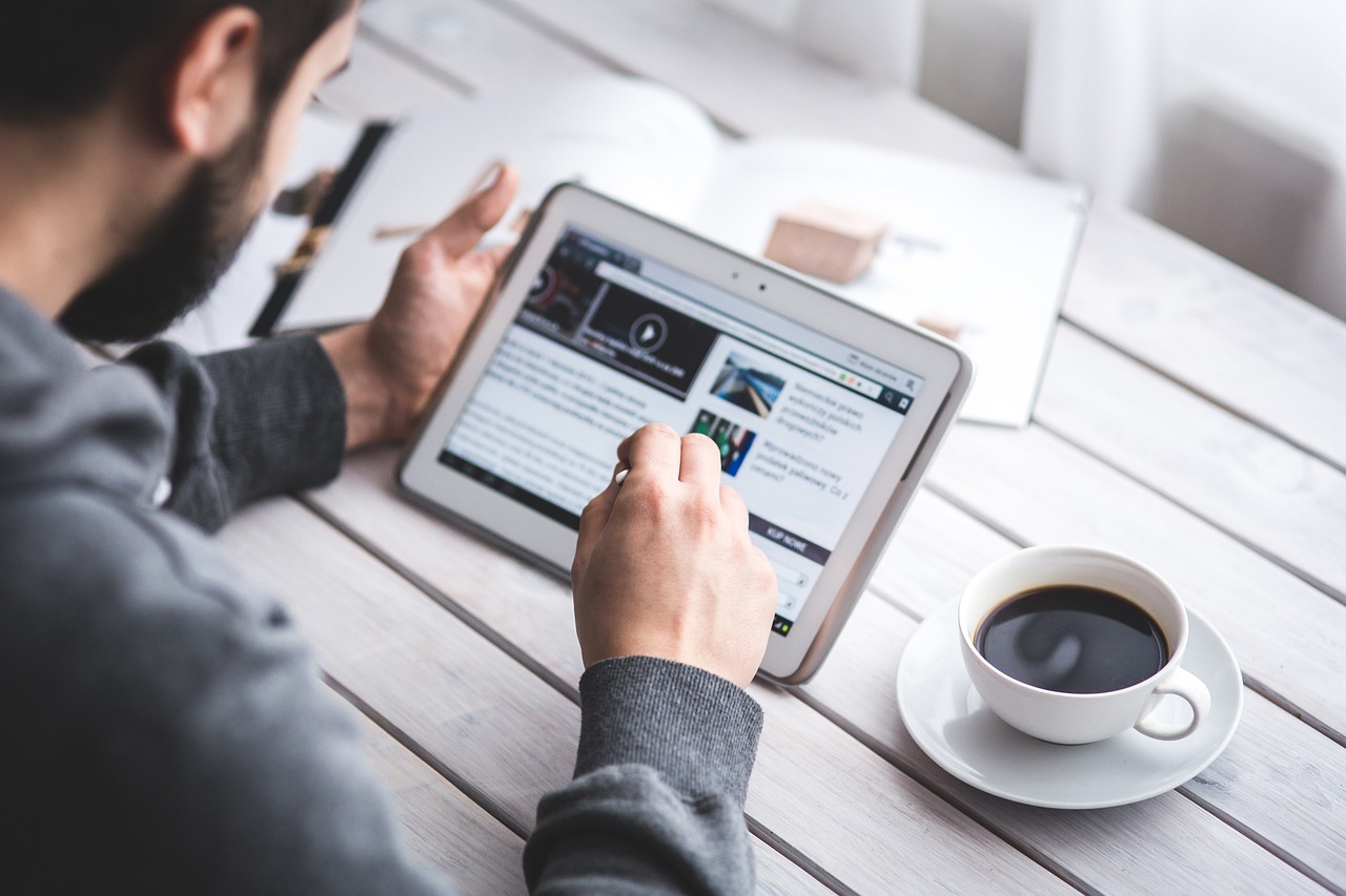 man reading landing page