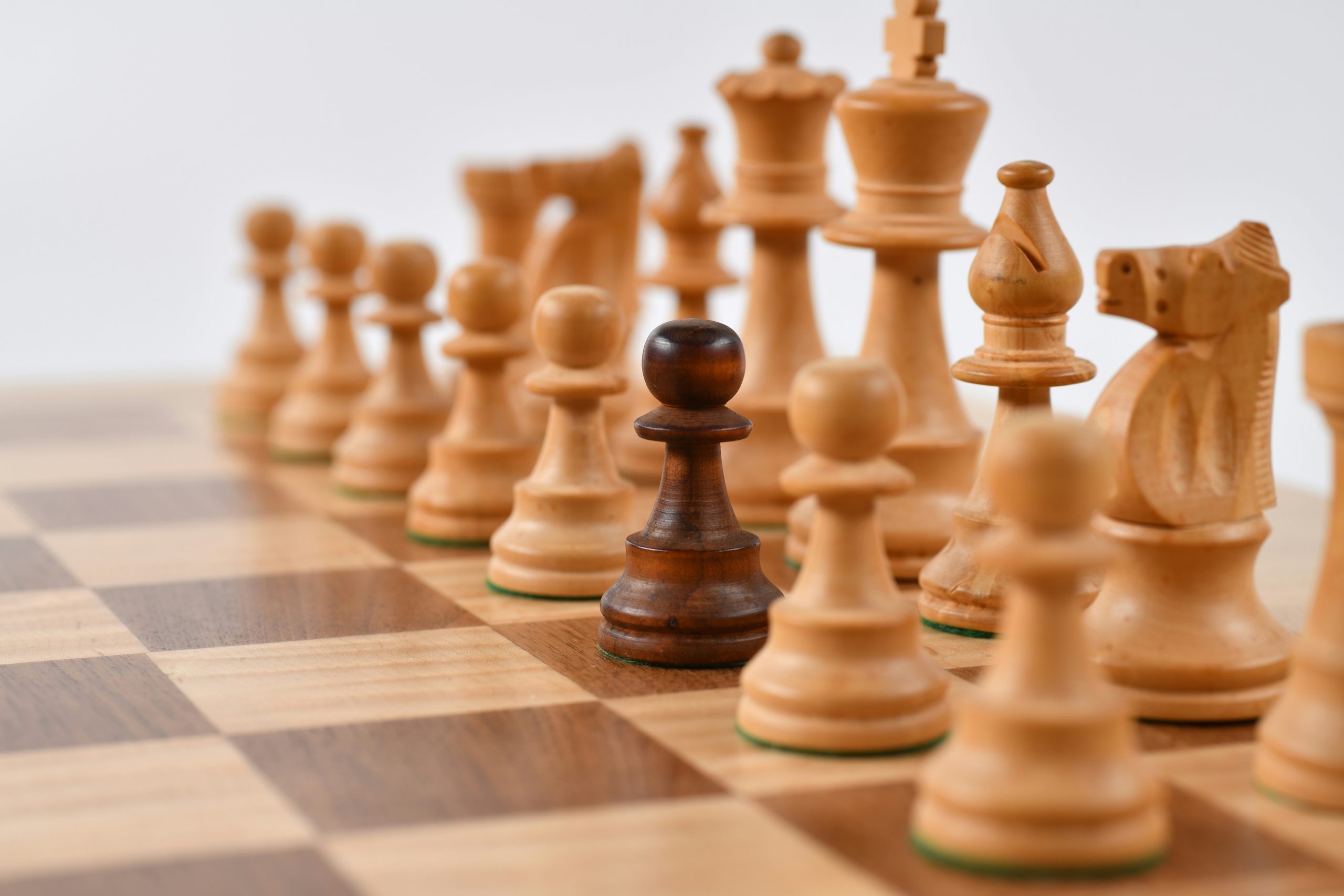 Unique chess piece standing out representing how authentic voice differentiates travel businesses